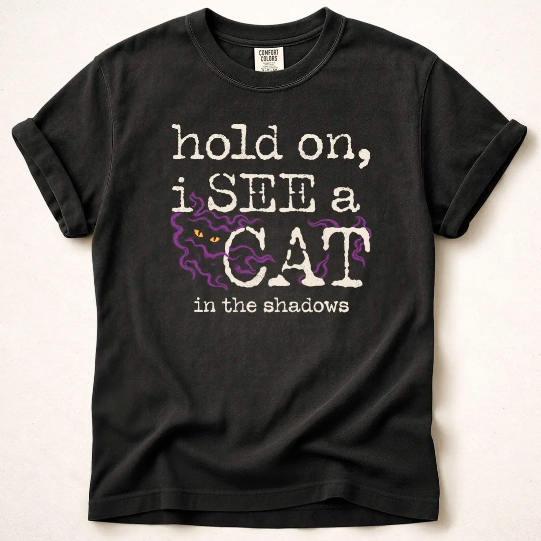 hold on, I see a cat in the shadow